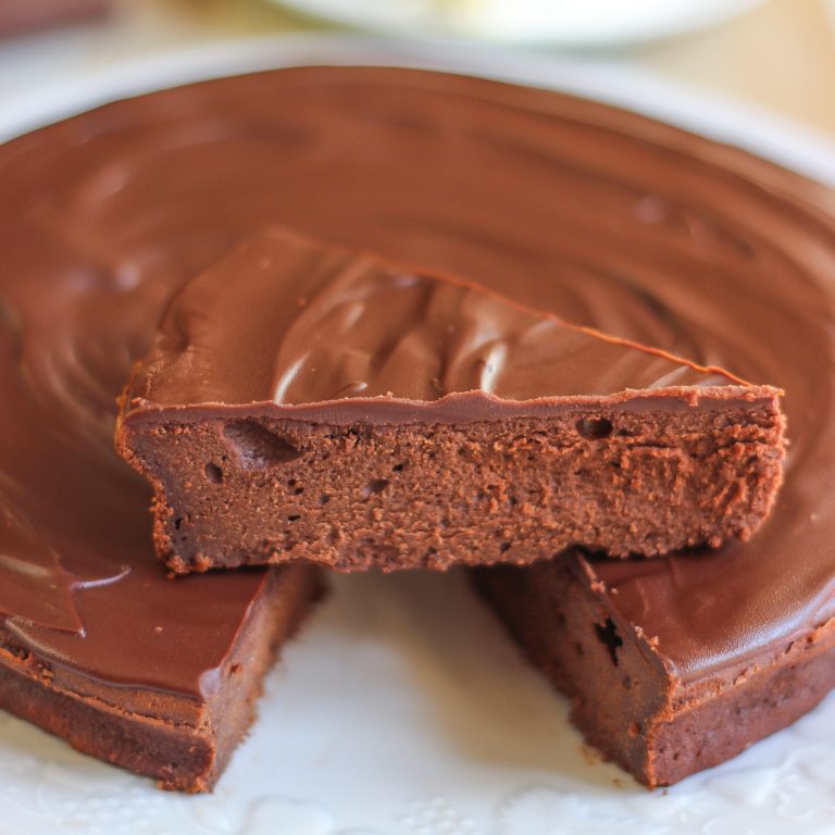 Chocolate fondant cake on a white plate